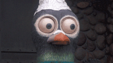 a close up of a pigeon wearing a towel on its head