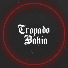 a black background with a red circle and the words tropado bahia