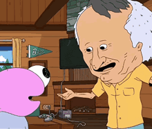 a man in a yellow shirt is talking to a cartoon character in front of a sign that says bobs