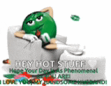 a green m & m sitting in a chair with the words `` hey hot stuff '' written on the bottom .