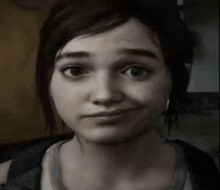 a close up of a woman 's face with a slight smile on her face