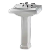 a white pedestal sink with chrome handles