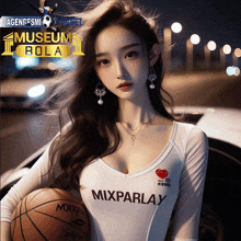 a woman holding a basketball with the word mixparlay on it