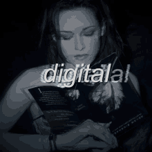 a black and white photo of a woman reading a book that says digitalal on it