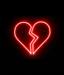 a red neon sign of a broken heart on a black background