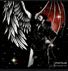 a photo of a man with angel wings and a devil wing