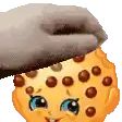 a cartoon cookie with a hat on it .