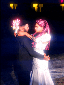 a man in a suit and a woman in a wedding dress are hugging each other