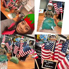 a woman wearing an elf hat is surrounded by american flags