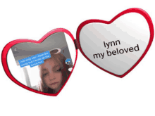 a heart shaped mirror says lynn my beloved