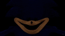 a close up of a sonic the hedgehog 's face with a big smile