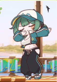 a girl wearing a blue hat with the letter a on it is dancing