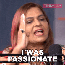 a woman says i was passionate in front of a pinkvilla sign