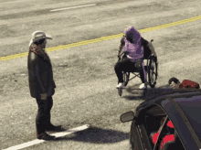 a man in a cowboy hat is standing next to a man in a wheelchair