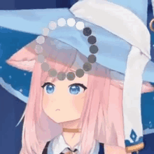 a girl with pink hair and blue eyes is wearing a witch hat and a necklace .