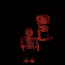 a boy and a girl standing next to each other in the dark