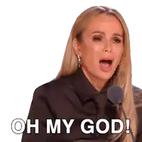 a woman speaking into a microphone with the words oh my god behind her
