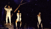 a group of people standing in a dark forest with a watermark that says imgflip.com at the bottom