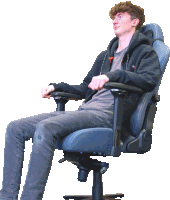 a man is sitting in an office chair with his arm resting on the arm rest