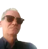 a man wearing sunglasses looks at the camera with a white background