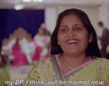 a woman says " my bp i think will be normal now " while smiling