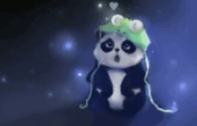 a panda bear wearing a green hat and headphones is sitting in the dark .