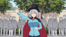 a girl in a top hat and cape is standing in front of a group of people