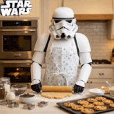 a storm trooper in an apron is rolling out dough in a kitchen