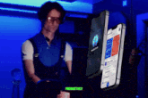 a man standing next to a phone that says productively