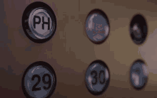 a person is pushing a button that says 29