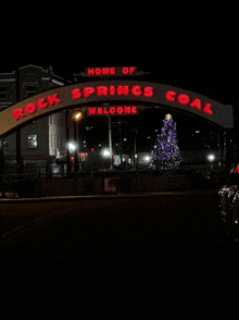 a sign that says rock springs coal welcome