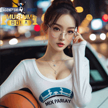 a woman wearing glasses and a mix parlay shirt holds a basketball in front of a car