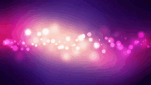 a purple and pink background with a wave of lights coming out of it