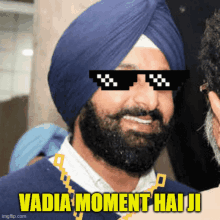 a man wearing a turban and sunglasses says " vadia moment haiji " on the bottom