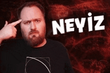 a man with a beard is pointing at his forehead in front of a red background .