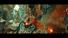 a person in a colorful costume with a skull on it