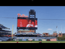 a phillies baseball stadium with a giant screen