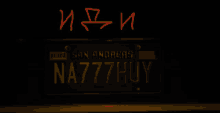 a yellow car with a license plate that says na777huy on it