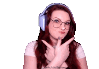 a woman wearing headphones and glasses says twitch.tv/fiamma on the bottom