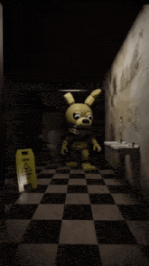 a yellow caution sign is on the floor in a dark bathroom