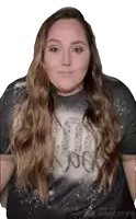 a woman wearing a t-shirt that says ' i love you ' on it