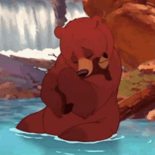 a cartoon bear is holding a baby bear in the water