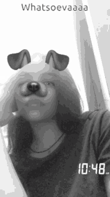 a black and white photo of a girl wearing a dog face filter