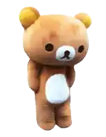 a brown teddy bear with yellow ears and a white chest