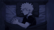 a boy with white hair is sleeping on a bed with a black pillow