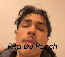 rita du peach is the name of the man shown