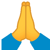 a person 's hands folded in prayer with a blue shirt behind them