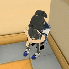 a girl in a school uniform is sitting on the floor with her head down