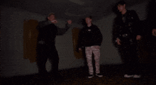 a blurry picture of a person 's legs in a dark room