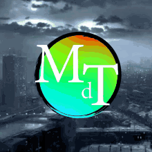 a colorful circle with the letters m and t inside of it